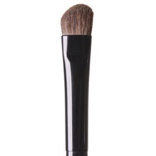 A flat shaped with angled tip brush of pony hair for lining, shading or shaping the eye or eyebrows