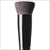 A flat shaped brush of goat hair particularly designed for cheek contour.
